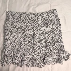 Green and white flowered skirt